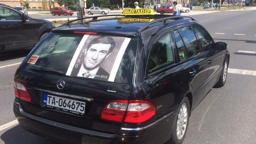 A Sarajevo taxi displays a picture of Robert De Niro