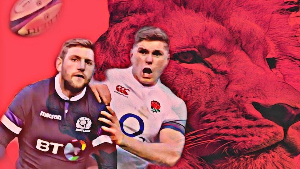 Finn Russell and Owen Farrell in front of a red lion.