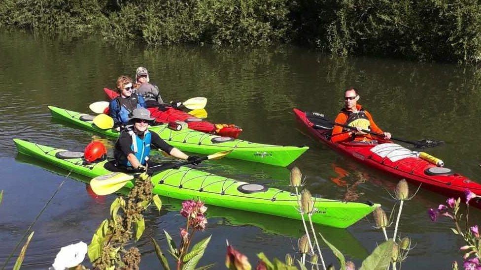 The kayakers in the river