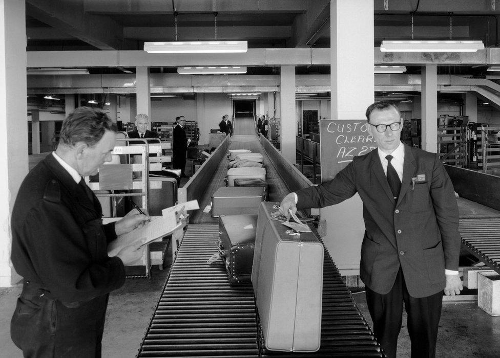 London Airport (later to be re-named Heathrow), baggage sorting area, 1950s