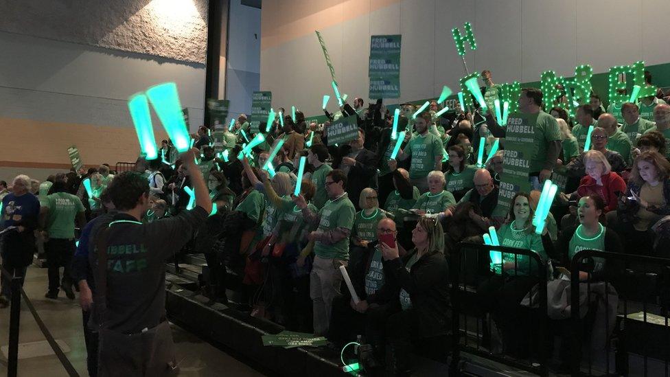 Fred Hubble supporter wave glowing sticks at the 2017 Iowa Fall Gala