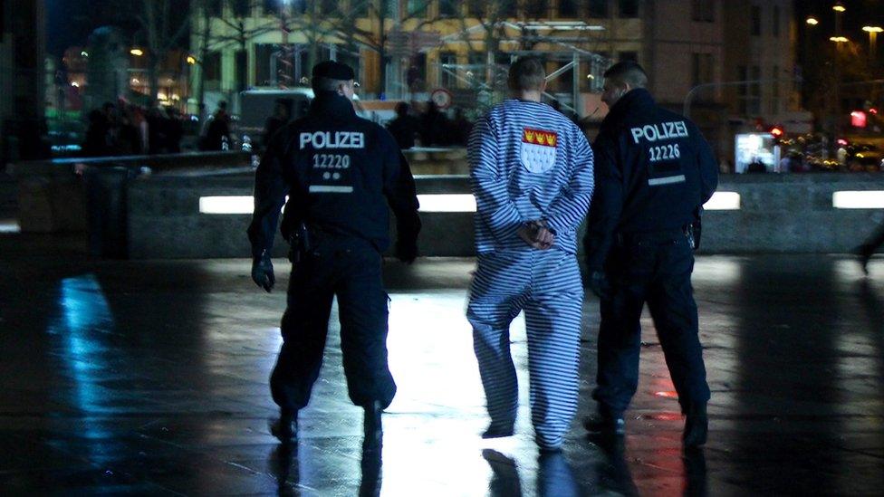 Cologne police arrest a man in costume