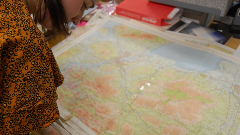 Dr Francis Kane, QUB, inspects a map