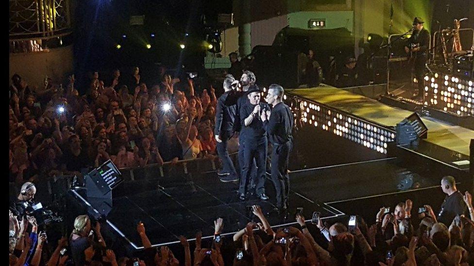 Robbie Williams and Take That on stage at the Troxy in London