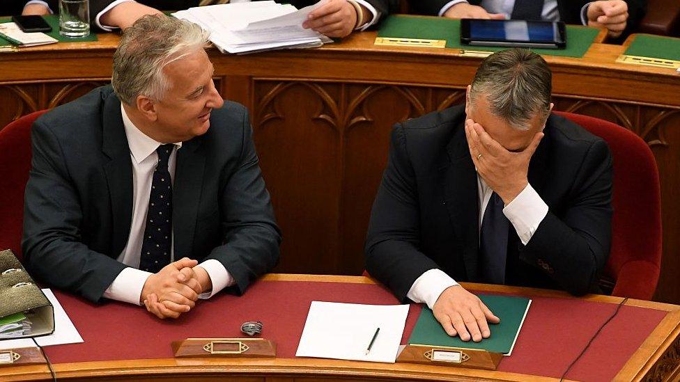 Hungarian Prime Minister Viktor Orban (R) and deputy Prime Minister Zsolt Semjen (L) attend a session at parliament on 8 November 2016 in Budapest, after a parliamentary vote on a constitutional amendment to ban the mass relocation of migrants