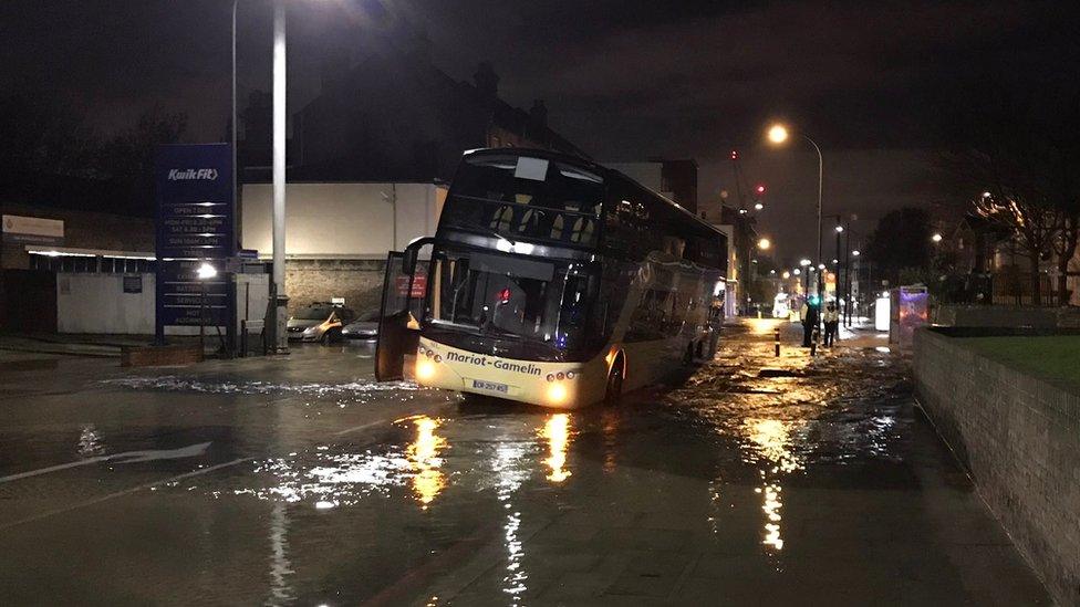 Coach stuck in sink hole