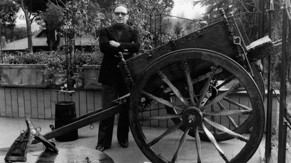 Ennio Morricone smiling in the garden. Rome, 1970s