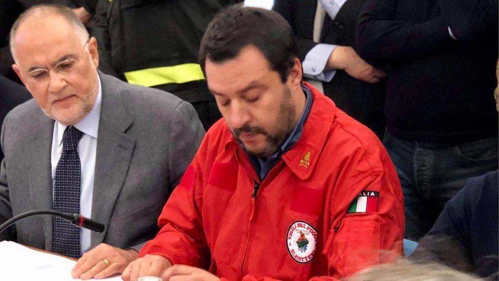 Mr Salvini pictured wearing the fire service uniform