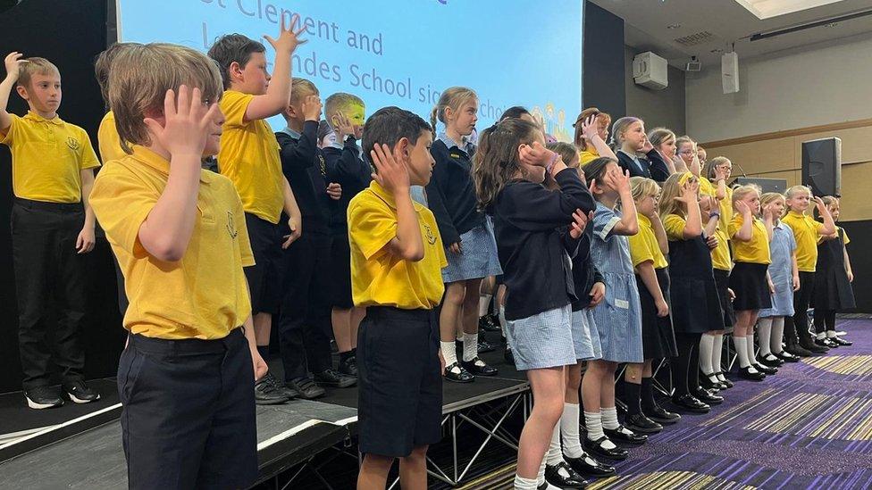 Children performing sign language song