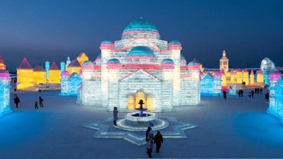 people-attending-the-ice-and-snow-sculpture-festival