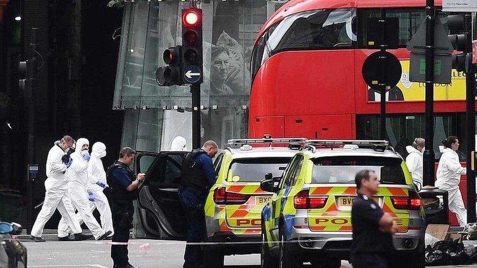 Police and forensics teams in the aftermath of the June 2017 London Bridge attacks