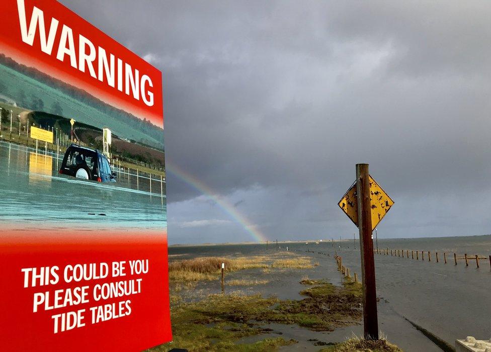 Holy Island causeway warning sign