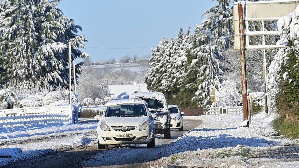 Cars on snowy roads