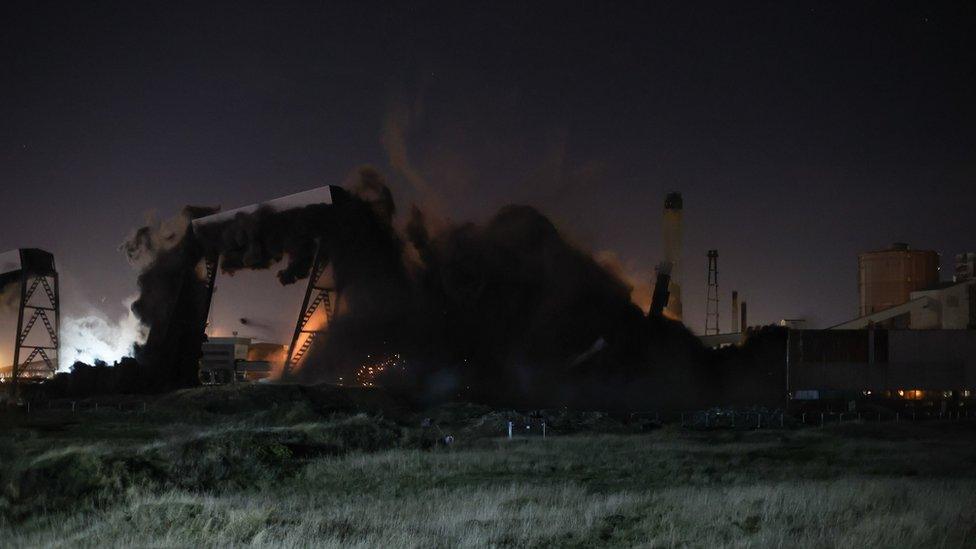 Cloud of smoke where building