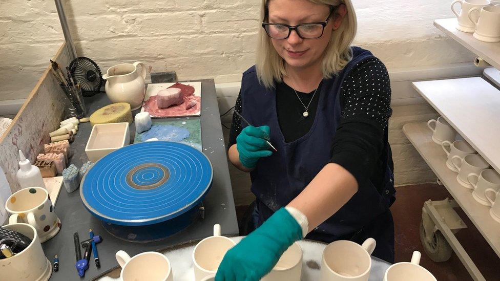 Woman working at Emma Bridgewater factory in Hanley, Stoke-on-Trent