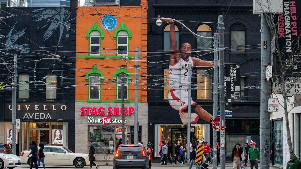 Sneaker store Overdose Toronto has a mural of Kawhi Leonard on its exterior facade