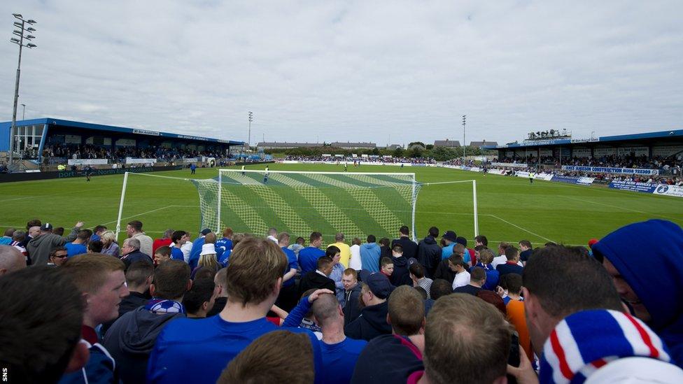 Almost 4,500 fans pack in to Peterhead's Balmoor Stadium to watch Rangers' first match in the Third Division