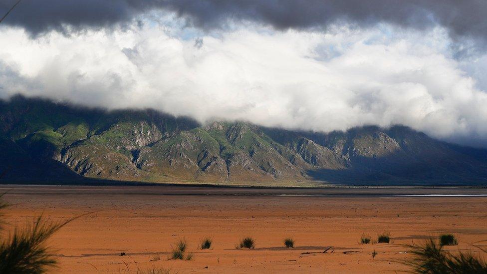 A general view of the critically low Theewaterskloof Dam in Villiersdorp, South Africa, 23 January 2018