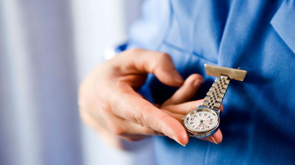 Nurse with watch