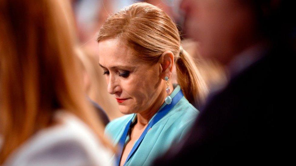 Cristina Cifuentes looks downwards