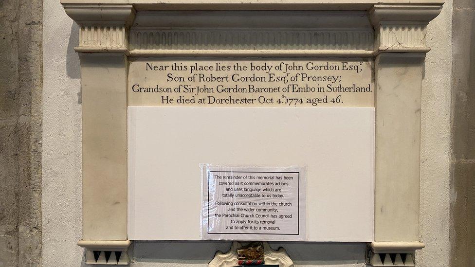 Covered memorial stone to John Gordon in St Peter's in Dorchester