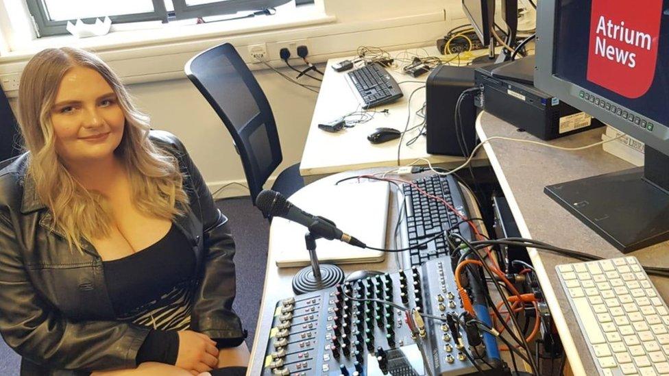 Danielle Herbert sitting at a desk