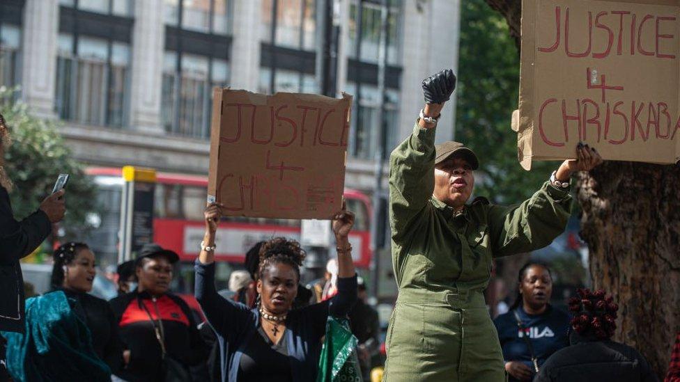 Protestors outside of Brixton Police station