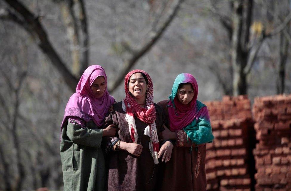 Faizan's mother (in the centre)