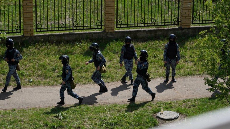 Tactical team responds to a deadly shooting at School Number 175 in Kazan, Tatarstan, Russia May 11, 2021 in this image obtained from social media