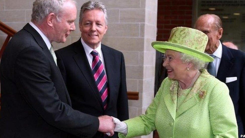 Martin McGuinness shakes hands with the Queen