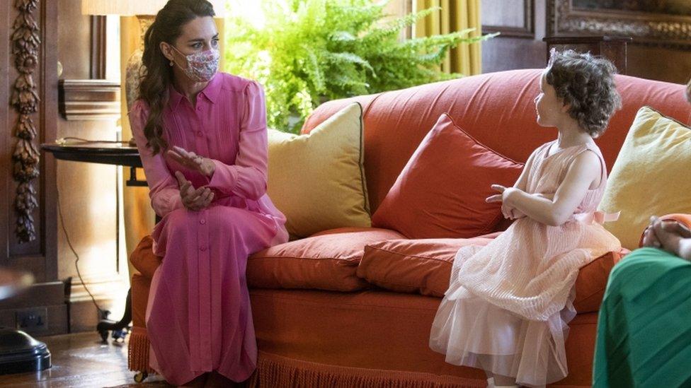 he Duchess of Cambridge meeting Mila Sneddon, aged five, at the Palace of Holyroodhouse in Edinburgh. Cancer patient Mila features in an image from the Hold Still photography project which showed her kissing her father Scott through a window whilst she was shielding during her chemotherapy treatment. Picture date: Thursday May 27, 2021. PA Photo. See PA story ROYAL Cambrid