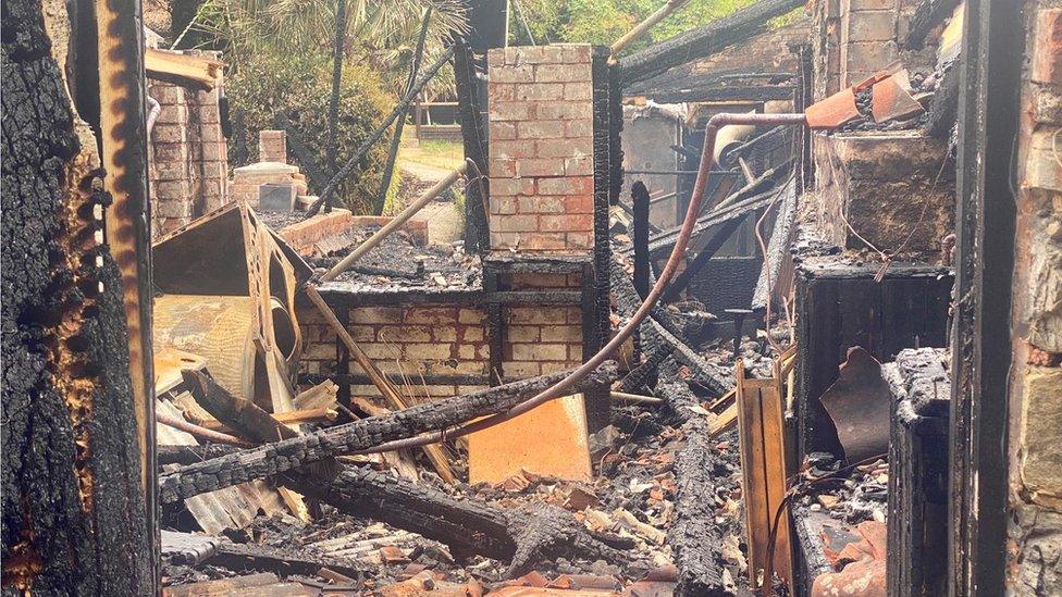 The inside of a burnt out pub