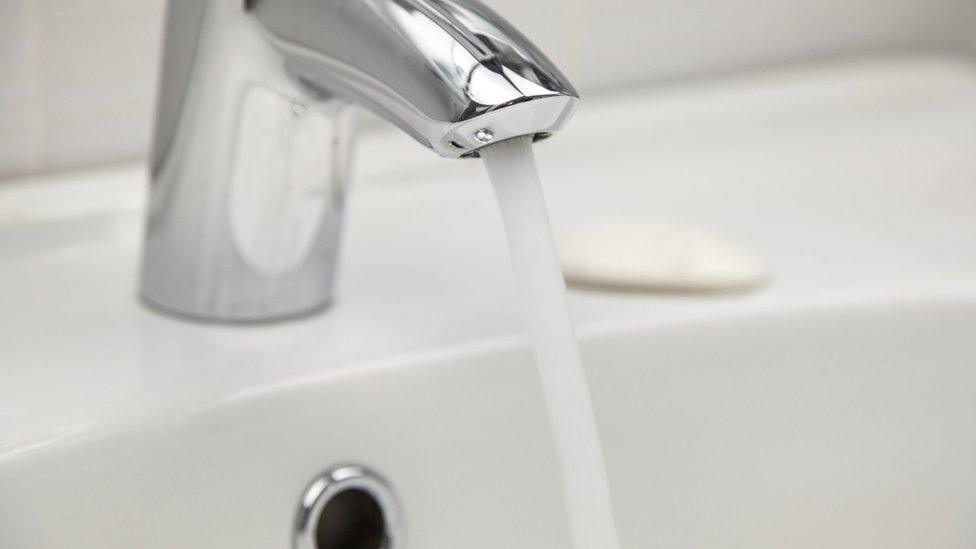 Tap water running