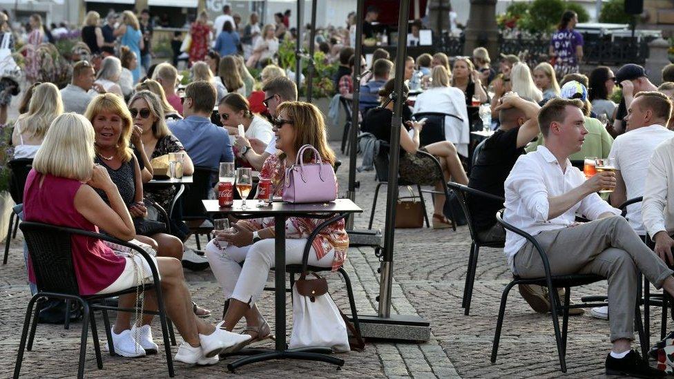 People drinking in central Helsinki