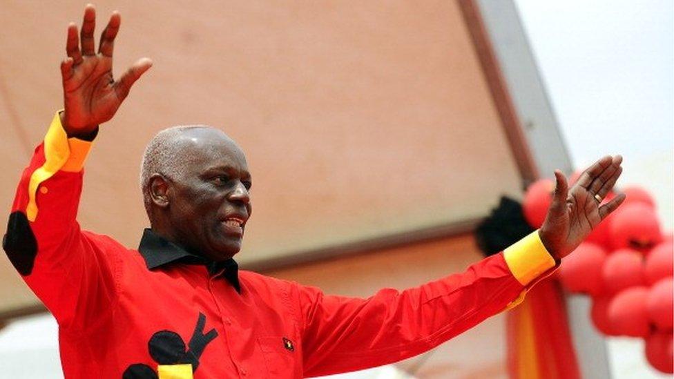 Angolan President Jose Eduardo dos Santos Angolan greets the crowd on August 29, 2012 during the final election campaign rally in Kilamba Kaixi on the outskirts of Luanda