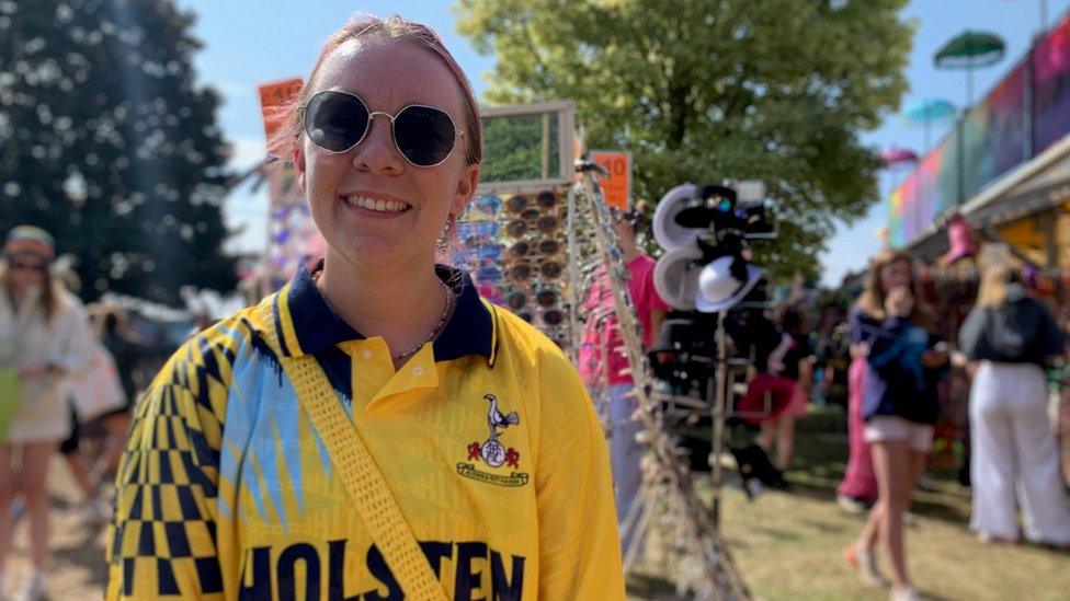 Ffion Moon wearing a Spurs shirt at Latitude