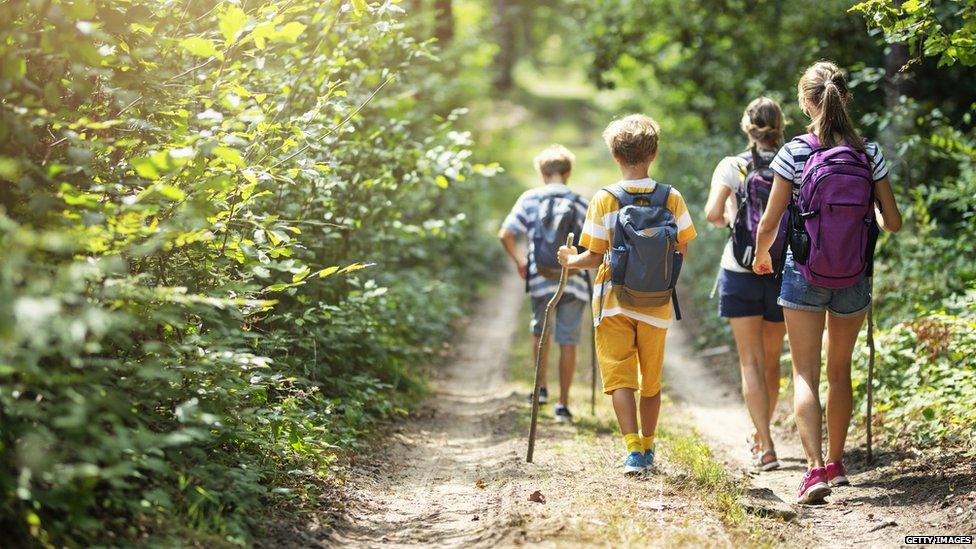 kids walking in countryside