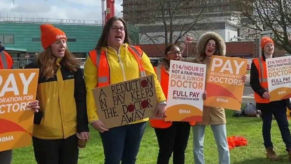 Junior doctors sing their protest chants to popular tunes on picket lines in England.