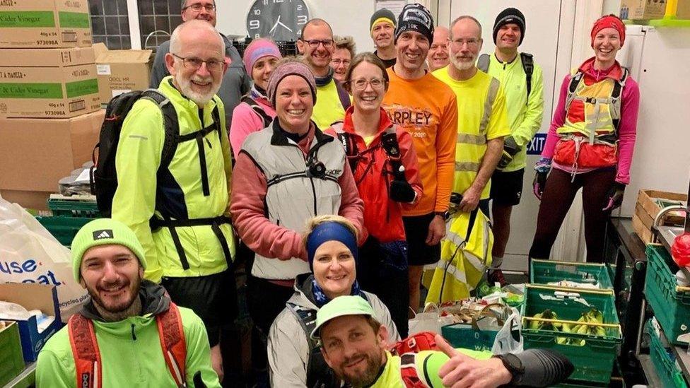 Felixstowe Road Runners at the Salvation Army food bank in the town