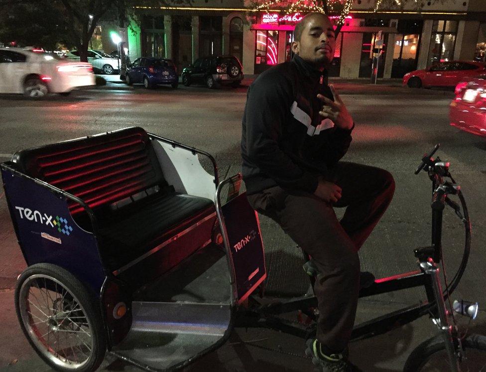 Roland the pedicab driver with his bike taxi