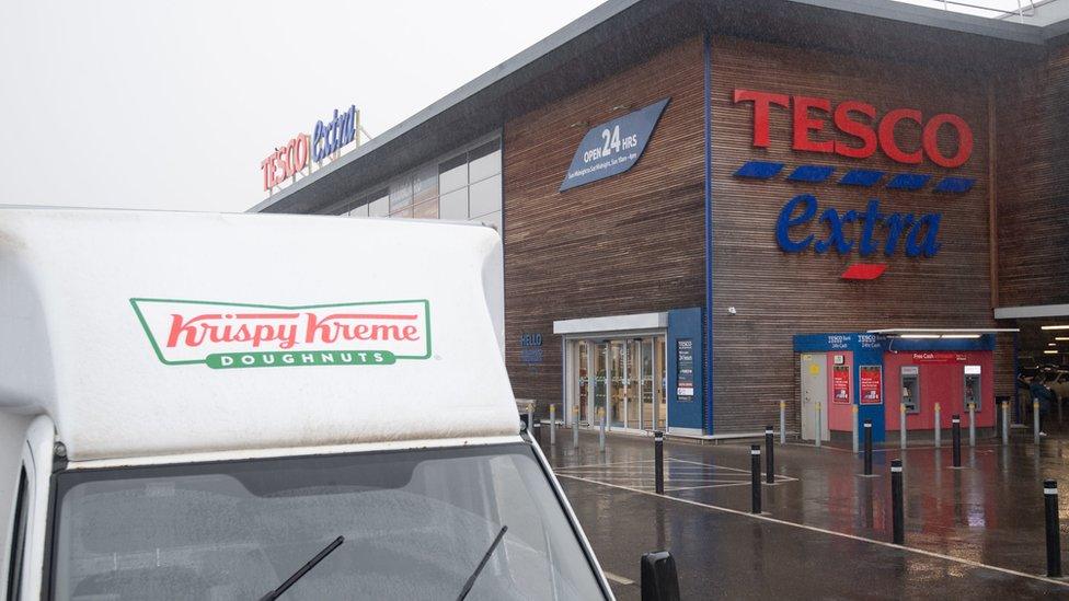 Krispy Kreme donut van outside Tesco Extra store in Wisbech