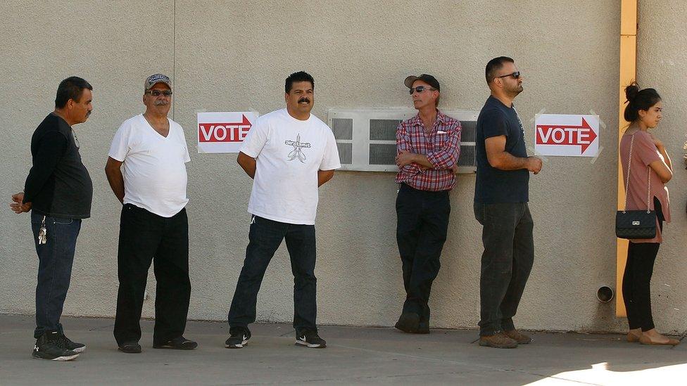 Voters waiting to cast ballots on 9 November in Phoenix, Arizona