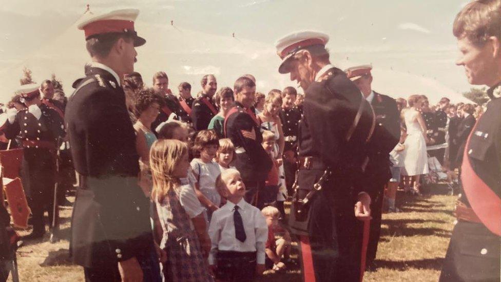 Prince Philip talking to Lt Col Simon Hollington's son James, who was 4 at the time.