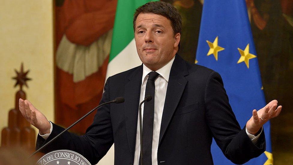 Italy's Prime Minister Matteo Renzi announces his resignation during a press conference at the Palazzo Chigi following the results of the vote for a referendum on constitutional reforms