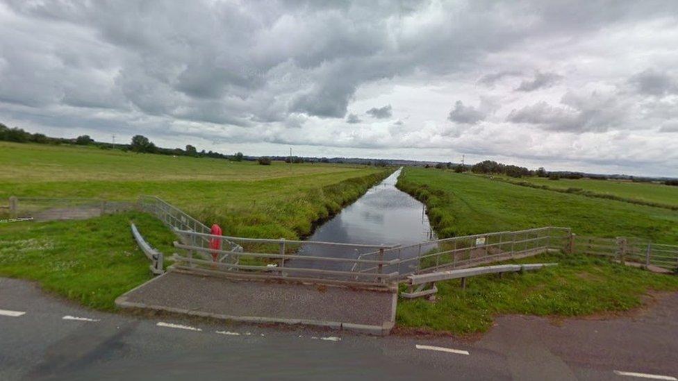 The River Sowy seen from the A372 at Othery