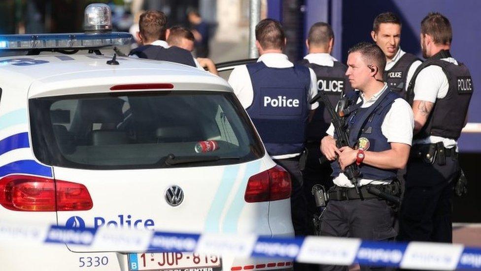 Police secure the area around a police building in the southern Belgian city of Charleroi following a machete attack on August 6, 2016