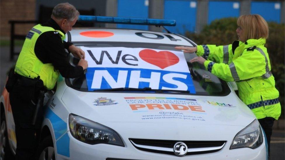 Staff put a sign on the windshield in support of the NHS at the Freeman Hospital in Newcastle upon Tyne, to salute local heroes during Thursdays nationwide Clap for Carers