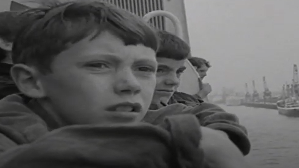 Young boys at a ferry rail