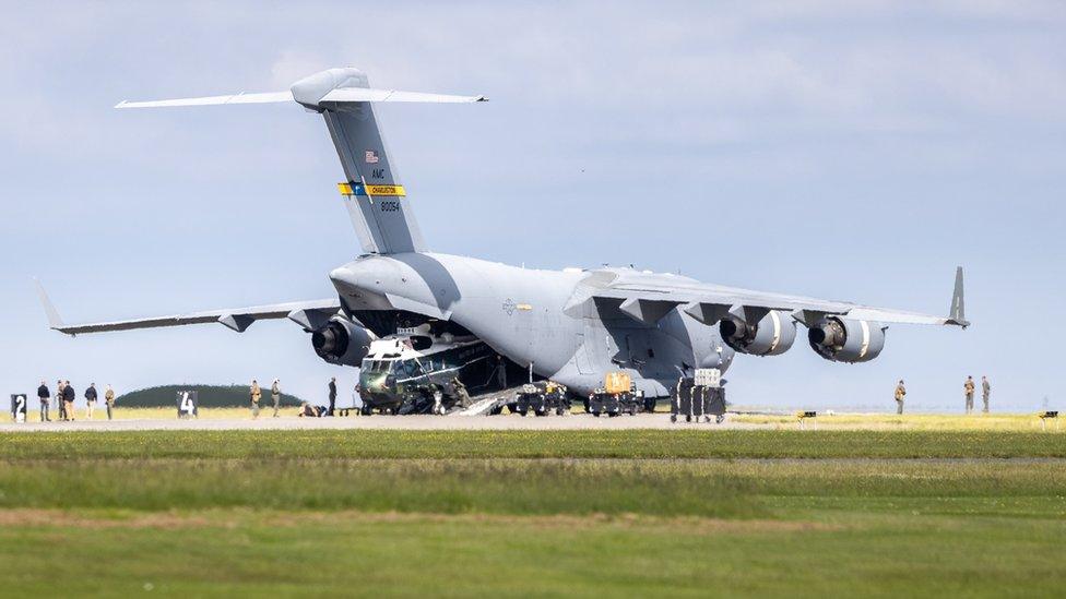 Sikorsky VH-3D helicopter in Globemaster cargo plane.