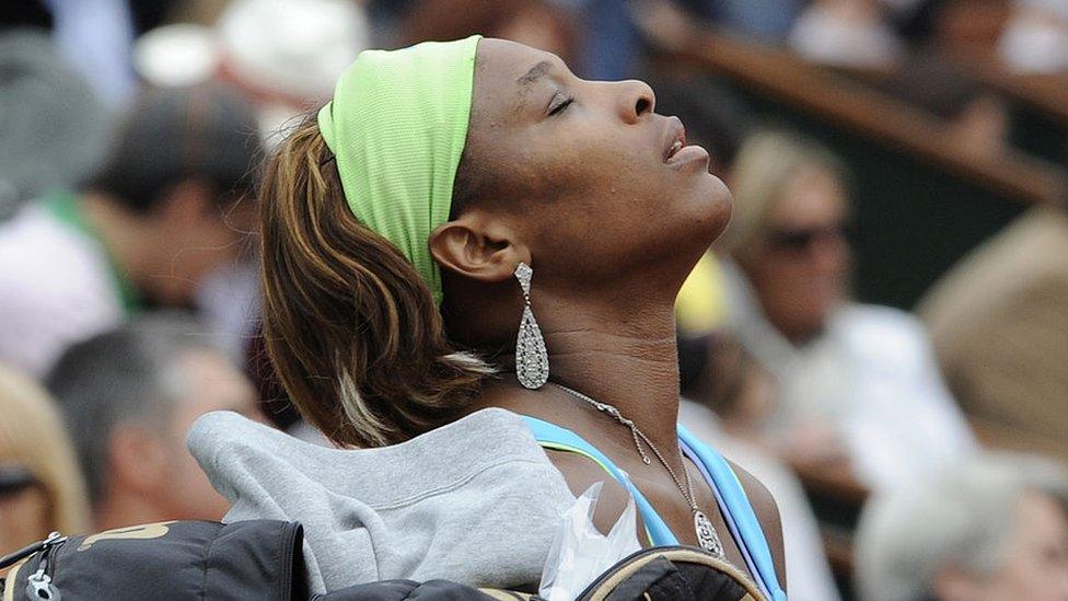 Serena Williams looks up to the sky during a 2010 tournament